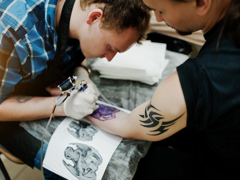 tattooist at work