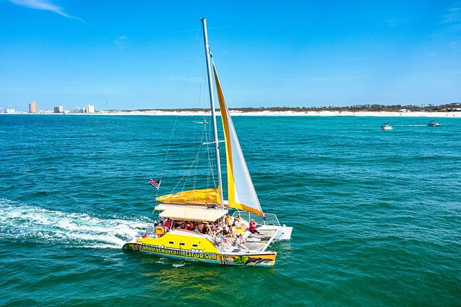 Panama City Beach Dolphin Sightseeing Sail - Onboard Experience: Drinks, Music, and Atmosphere