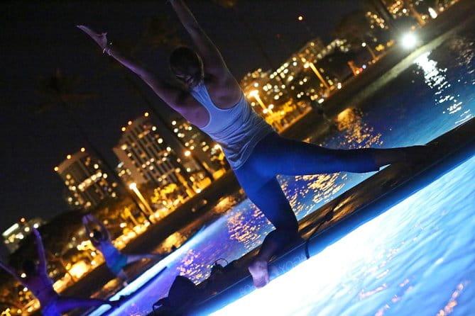 Night SUP Yoga in Honolulu, Hawaii - The Experience in Action