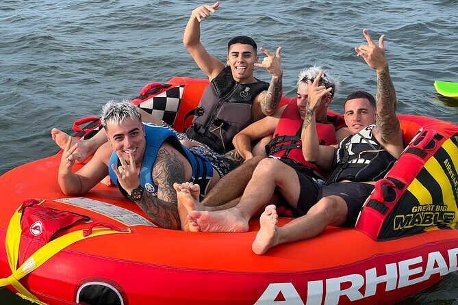 Aquatic Adventure: Boat Tour with Jetskis, Tubing, and Open Bar - An In-Depth Look at the Experience