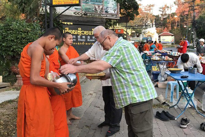 Alms and Wat Phra That Doi Suthep Private Chiang Mai Tour - Starting Early with a Private Pickup