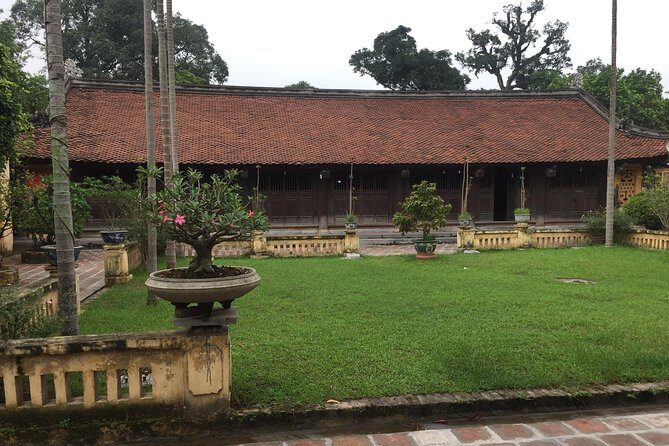 Ancient Village & The Legend of Co Loa Tour by E-Bike - Crossing Nhat Tan Bridge
