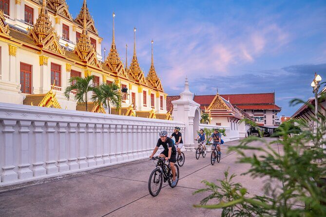 Bangkok: Night Bike Tour with Temples & Flower Market Visit - The Authentic Experience