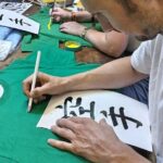 Calligraphy on T-shirt and lantern near Skytree Tokyo - What to Expect: The Practical Details