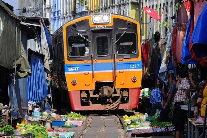 Floating Market Damnoen Saduak and Meklong Railway Market: Half Day Tour - Practical Tips for Travelers