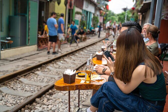 Hanoi Train Street Food Walking Tour - Detailed Breakdown of the Itinerary