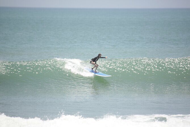 Surfing Activity with Beginner and Intermediate Lesson - What You Receive: Photos, Videos, and Extras