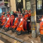 Vespa Female Ao Dai riders Night Street Food + Train Street Tour - The Sum Up