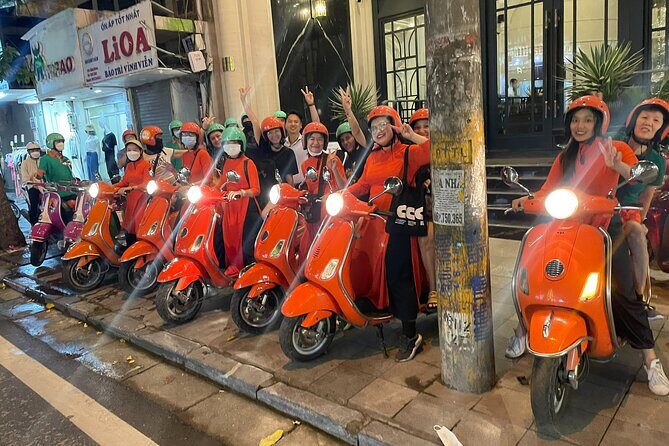 Vespa Female Ao Dai riders Night Street Food + Train Street Tour - The Sum Up