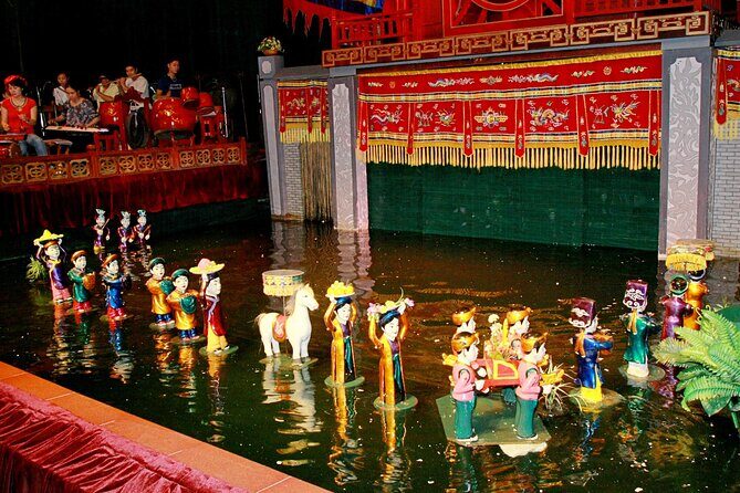 3-hour Dinner cruise on Saigon river plus Cyclo & Water puppet show evening - Discovering the Water Puppet Show at Golden Dragon Theater