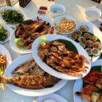 Bali Cycling and Uluwatu Sunset Tour with Dinner Packages - Lunch and Beach Time: Padang Padang and Jimbaran