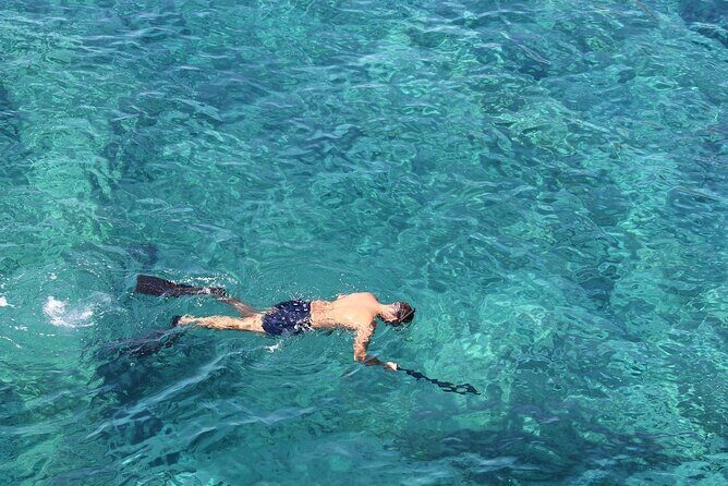 Bali Snorkeling Tour at Blue Lagoon Including Kanto Lampo Waterfall - The Boat Ride and Scenic East Coast Views