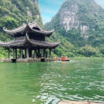 Half Day Guided Bike and Boat Tour in Hoa Lu, Ninh Binh - Scenic Boat Ride at Tam Coc: Floating Through Natural Beauty