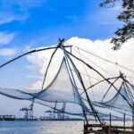 India's Tropical Malabar Coast Kerala Tour - Munnar: The Tea-Laden Hills and Scenic Wonders