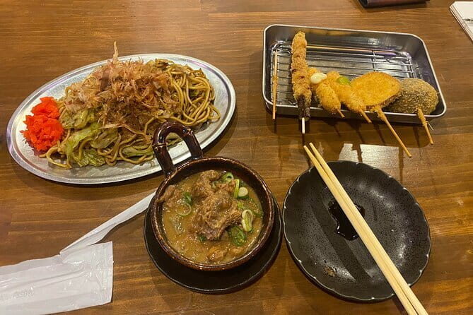 Night Soul Food Tour in Shinsekai with a local guide - The Flavors of Osaka: What You’ll Tuck Into