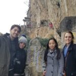 One-day West Hills and Bird & Flower Market Tour Kunming - Exploring the West Hills: Temples, Cliffs, and Panoramic Views