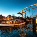 Amsterdam Evening Canal Cruise with Live Guide and Onboard Bar - Practical Details & Considerations