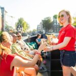 Amsterdam: Guided Open Boat Canal Cruise Including 1 Drink - The Boat and Comfort
