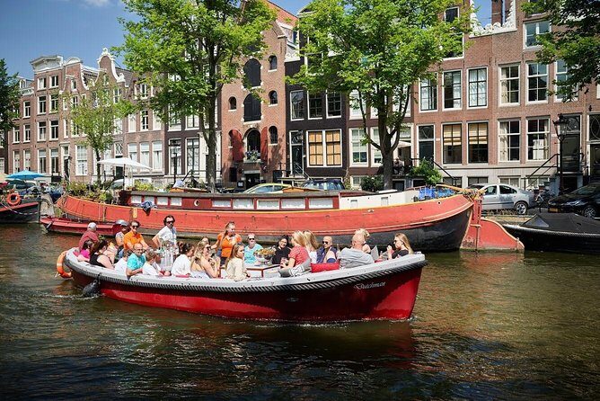 Amsterdam Light Festival: All-In Canal Cruise Covered Saloon Boat - Who Will Enjoy This Tour?