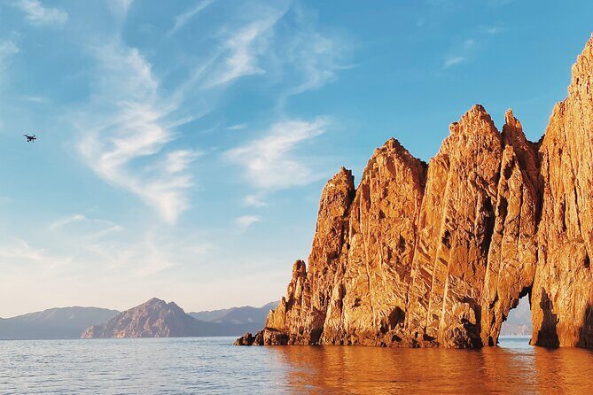 Cruise Sunset Aperitif Scandola/Gulf Porto/Piana Boat 12p - Who Should Consider This Experience?