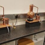 Distill a bottle of gin on mini copper stills - Practical Details and Value