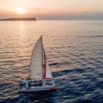 Fornells: Catamaran Sunset Cruise of Menorca's Coast - The Sum Up