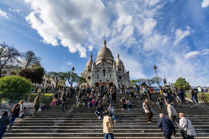 Montmartre guided walking tour with local guide in small group - The Itinerary in Detail: What You Can Expect