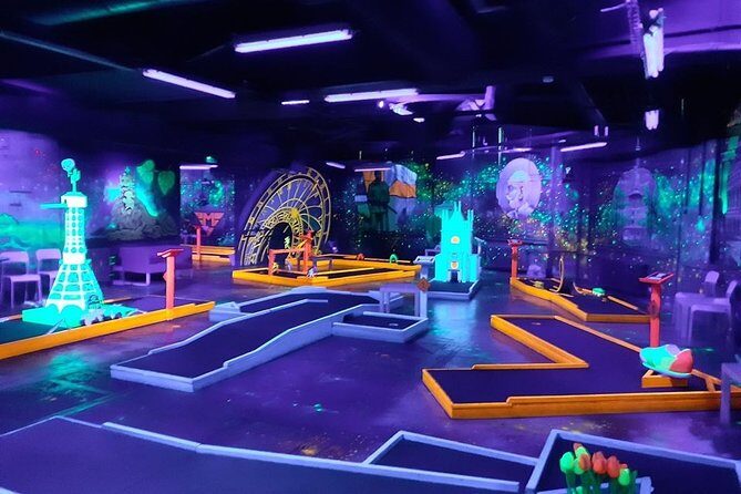Prague Black Light Mini Golf and Games Tour Including Free Drinks - The Sum Up