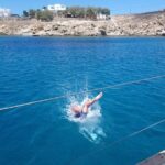 Private sailing cruise to Delos & Rhenia with Lunch & Transfer - Stop at Rhenia: Secluded Beaches & Crystal Waters