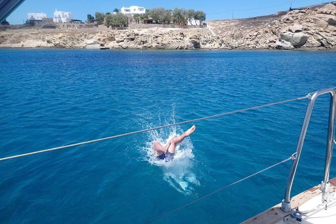 Private sailing cruise to Delos & Rhenia with Lunch & Transfer - Stop at Rhenia: Secluded Beaches & Crystal Waters