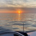 Sailing at sunset along the cliffs of Maro-Compartida - Why This Tour Delivers Great Value