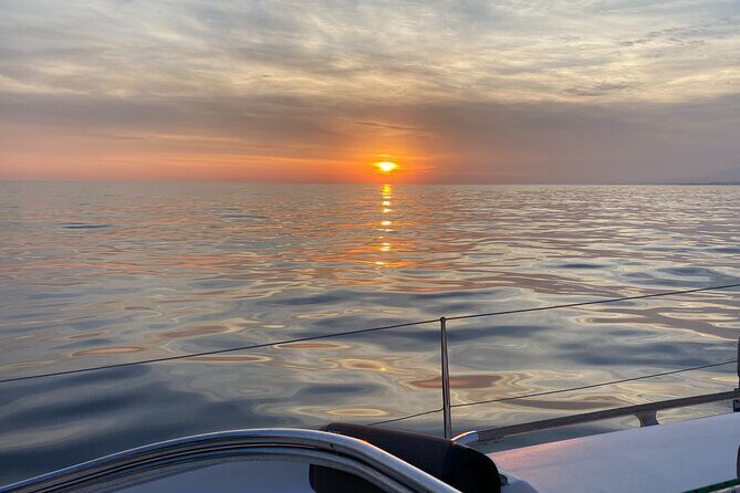 Sailing at sunset along the cliffs of Maro-Compartida - Why This Tour Delivers Great Value