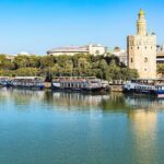 Tour in Seville Tourist Bus, Panoramic Cruise and Walking Tour - The Scenic Guadalquivir Cruise