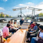 Amsterdam: 75 minute Open Boat Canal Cruise with Live Guide - How the Itinerary Brings the City to Life