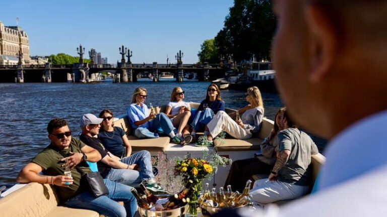 Amsterdam: Canal Cruise in Open Boat with Drink Option - The Stops and Sights