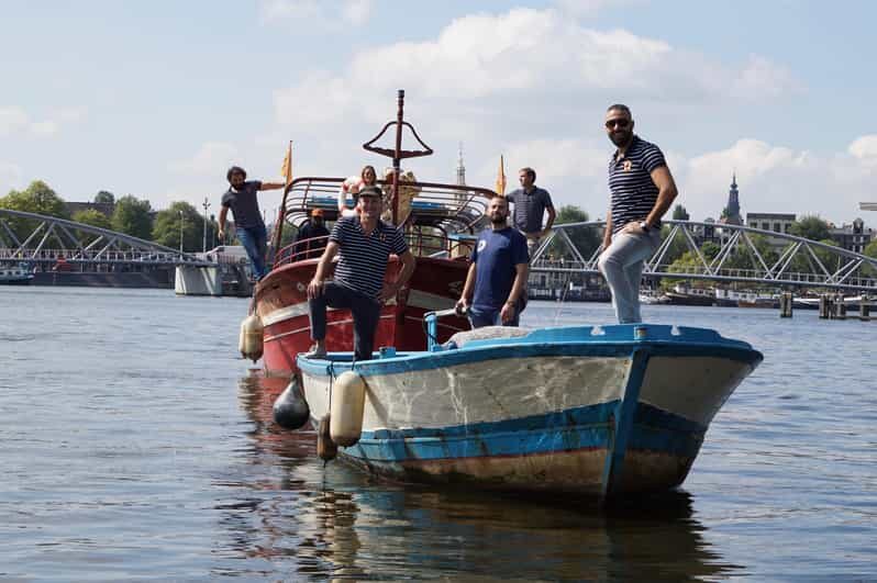 Amsterdam: Canal Cruise on a Wooden Refugee Boat - Practical Tips and Considerations