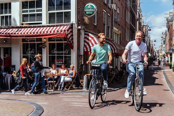 Amsterdam PRIVATE Bike Tour With Locals: Bike & Local Snack Included - Who Should Consider This Tour?