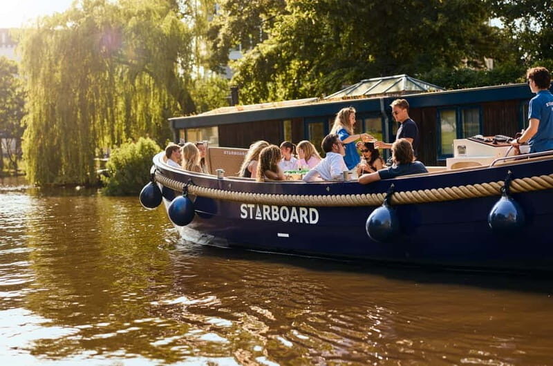Amsterdam: Spanish Guided Open Boat Cruise with Bar Onboard - The Sum Up