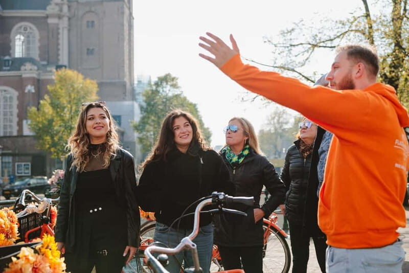 Amsterdam: Top Highlights Guided Bike Tour EN/DE/ES/FR/IT/CN - Experience Quality and Practical Details