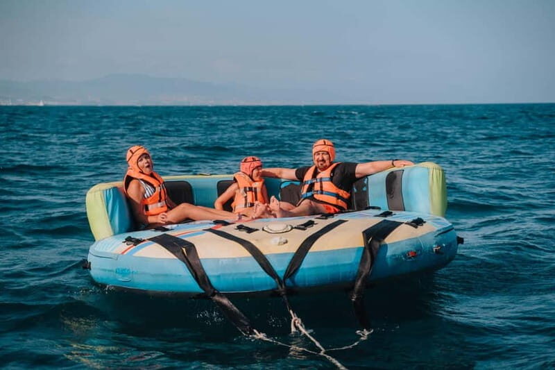 Barcelona: Inflatable Water Tube Ride at Port Olímpic - Practical Details and Considerations