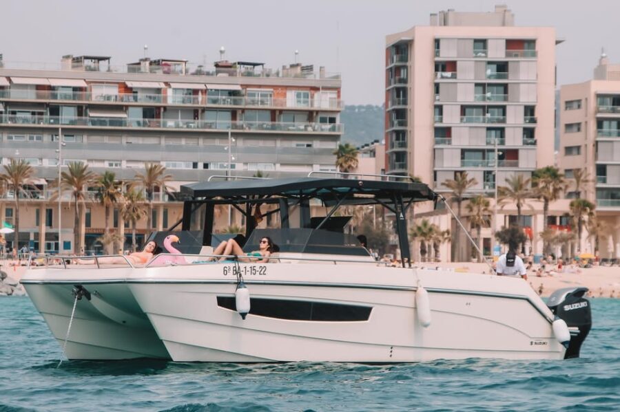 Barcelona: Night on a Catamaran with private dinner and navigation - Why This Experience Might Be Perfect for You