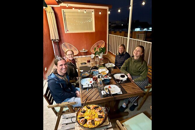 BBQ Paella in a Penthouse Terrace in Barcelona with a Chef - Authenticity and Learning