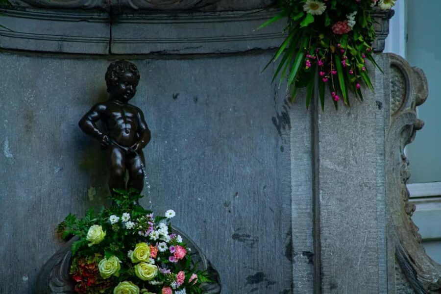 Brussels: Where Comics, Culture & Quirk Collide Walking Tour - Quirky Charm: Manneken Pis & Belgium’s Playful Humor
