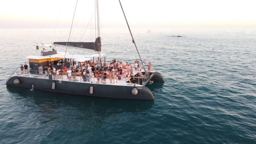 Cádiz: Sunset Catamaran Cruise with Drink - Drinks and Music: Elevating the Experience