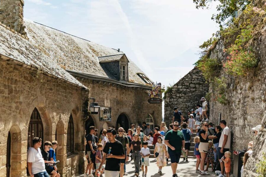 Day Trip to Mont-Saint-Michel from Paris - Stop at a Norman Village: A Taste of Local Charm