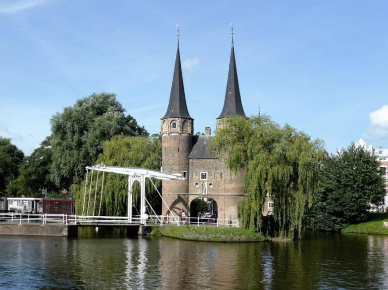 Delft - Private Historic Walking Tour - Walking Through Picturesque Streets and Canals