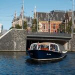 Discover Amsterdam: 75-Minute Luxury Cruise with Commentary - Breaking Down the Itinerary