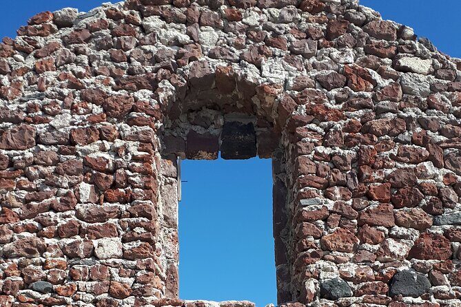 Discover Santorini - Kamari Beach: The Black Sand Haven