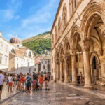 Dubrovnik: City Walls, Old Town Walking Tour & Adriatic View - Walking Through Dubrovnik’s Old Town