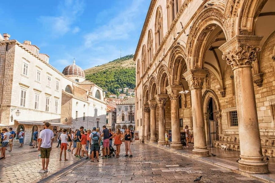Dubrovnik: City Walls, Old Town Walking Tour & Adriatic View - Walking Through Dubrovnik’s Old Town